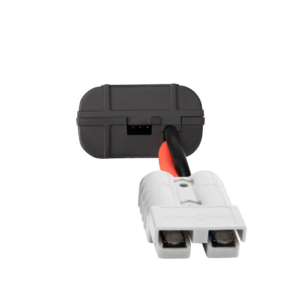 The 200 AMP Digital Volt Watt Meter with Anderson-Style Connectors features its dark gray casing and white Anderson connector with copper terminals.