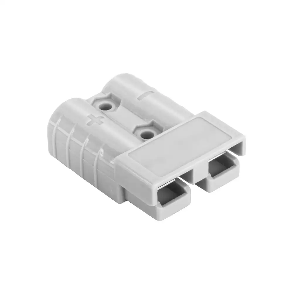 This 50A Grey Anderson-Style Connector with Dust Cover features a ribbed body, a visible plus sign, and its light grey rectangular dust cover.